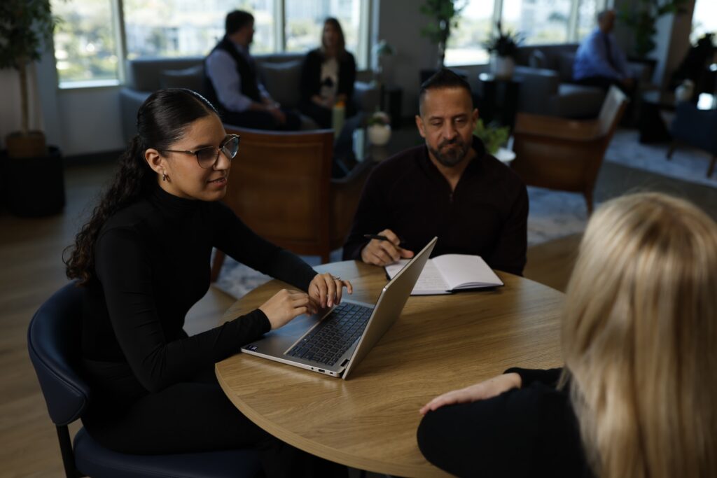 Colleagues meeting around a table